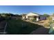 A beautifully landscaped backyard with a covered patio offers a serene outdoor living space at 10006 N 7Th Pl, Phoenix, AZ 85020