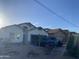 Single-Gathering home with two cars parked in the driveway, desert landscaping, and an attached two-car garage at 10006 N 7Th Pl, Phoenix, AZ 85020