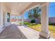 Spacious back patio with stylish columns offers an inviting space for relaxation and outdoor enjoyment at 1062 N Robin Ln, Mesa, AZ 85213