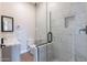 Modern bathroom featuring a glass shower with tile surround at 1062 N Robin Ln, Mesa, AZ 85213