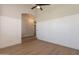 Spacious bedroom with wood floors and white wainscotting at 1062 N Robin Ln, Mesa, AZ 85213