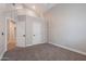 Carpeted bedroom featuring a built-in loft with ladder access at 1062 N Robin Ln, Mesa, AZ 85213