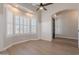 Bay window dining area with shutter shades and hardwood floors at 1062 N Robin Ln, Mesa, AZ 85213