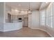 Eat-in kitchen features stainless steel appliances, white countertops, and light gray cabinets at 1062 N Robin Ln, Mesa, AZ 85213