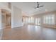 Large open-concept living room with fireplace and doors to backyard at 1062 N Robin Ln, Mesa, AZ 85213