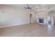 Spacious living room with high ceilings and fireplace with gray tile at 1062 N Robin Ln, Mesa, AZ 85213