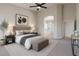 Comfortable main bedroom with a view to the ensuite bathroom, a large bed, and soothing decor, promoting relaxation at 1062 N Robin Ln, Mesa, AZ 85213