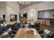 Elegant dining area with fireplace, table and chairs at 11300 N Casa Dega Dr # 1019, Surprise, AZ 85388