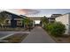 Inviting exterior walkway leading to amenities at 11300 N Casa Dega Dr # 1019, Surprise, AZ 85388