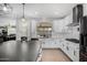 Modern kitchen featuring white cabinets, stainless appliances and an island at 12601 W San Miguel Ave, Litchfield Park, AZ 85340