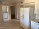 Open concept kitchen with refrigerator at 13603 N 111Th Ave, Sun City, AZ 85351
