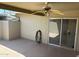 Covered patio with ceiling fan, accessible through sliding glass door at 13603 N 111Th Ave, Sun City, AZ 85351