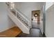 Welcoming entryway features staircase, stone tile, and security door at 1406 E Jasper Dr, Chandler, AZ 85225