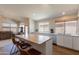 Kitchen with wood-top island and barstool seating at 15128 W Melissa Ln, Surprise, AZ 85374
