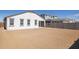 Spacious backyard featuring a blank canvas for landscaping, surrounded by a block wall for privacy at 17778 W Turquoise Ave, Waddell, AZ 85355