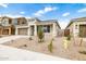 Charming single-story home features a two-car garage and low-maintenance landscaping at 17778 W Turquoise Ave, Waddell, AZ 85355