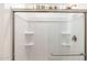 Shower stall with built-in shelves, and glass door at 17778 W Turquoise Ave, Waddell, AZ 85355