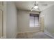 Neutral bedroom featuring a ceiling fan, blinds on the window, and light carpet flooring at 1831 S Hudson Dr, Chandler, AZ 85286