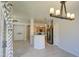 Open-concept layout with a view of the kitchen, adjacent living room, and dining area at 1831 S Hudson Dr, Chandler, AZ 85286