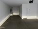 Bright garage with water heater and entry door at 18361 W Jessie Ln, Surprise, AZ 85387