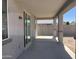Covered patio with neutral color scheme and concrete floor at 18361 W Jessie Ln, Surprise, AZ 85387