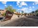 Venu at Grayhawk community entrance with stone wall and desert landscaping under a bright sky at 19777 N 76Th N St # 2243, Scottsdale, AZ 85255