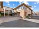 A two-story building with a driveway and two-car garage, exterior showing unit number at 19777 N 76Th N St # 2243, Scottsdale, AZ 85255