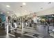Well-equipped gym features weight machines and a view of the pool and desert landscape at 19777 N 76Th N St # 2243, Scottsdale, AZ 85255