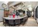 Modern kitchen with stainless steel appliances, stone countertops, and a large island with bar seating at 19777 N 76Th N St # 2243, Scottsdale, AZ 85255
