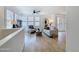 Living room with ceiling fan, plantation shutters and modern furnishings at 19777 N 76Th N St # 2243, Scottsdale, AZ 85255
