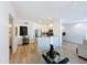 Bright open-concept living space showcases modern design, white walls, and a stylish workspace nook at 19777 N 76Th N St # 2243, Scottsdale, AZ 85255