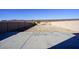 Backyard featuring a cement patio and a block wall fence at 19886 W Woodlands Ave, Buckeye, AZ 85326