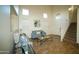 Open living room with high ceilings, wood floors, and plenty of natural light at 19886 W Woodlands Ave, Buckeye, AZ 85326