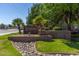 Landscaped entrance to Chesapeake Condominiums, a quiet community featuring manicured grounds and mature trees at 200 E Southern Ave # 226, Tempe, AZ 85282