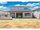 A backyard featuring a covered patio and outdoor living space at 21134 W Minnezona Ave, Buckeye, AZ 85396