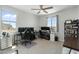 Spacious home office with dual workstations, natural light, and ample storage for productivity at 21134 W Minnezona Ave, Buckeye, AZ 85396