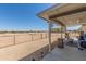 Relaxing covered patio area, perfect for outdoor entertaining and enjoying the desert scenery at 22578 E Sahara Dr, Florence, AZ 85132