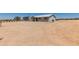 Charming single-story home featuring a metal roof and low-maintenance landscaping at 22578 E Sahara Dr, Florence, AZ 85132