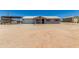 Inviting single-story home with a durable metal roof and desert landscaping at 22578 E Sahara Dr, Florence, AZ 85132