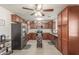 Spacious kitchen with ample cabinets, a center island, and stainless steel appliances at 22578 E Sahara Dr, Florence, AZ 85132