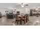 Open-concept living and dining area with abundant natural light and a cozy ambiance, perfect for entertaining and relaxation at 22578 E Sahara Dr, Florence, AZ 85132