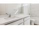 Clean and bright bathroom features a vanity with white countertop and modern fixtures at 25478 W Graham Trl, Buckeye, AZ 85326