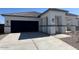 Beautiful single-story home featuring stone accents, manicured front yard, and an attached two-car garage at 25481 W Graham Trl, Buckeye, AZ 85326