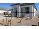 Inviting single-story home featuring stone accents, gravel landscaping, and an attached two-car garage at 25481 W Graham Trl, Buckeye, AZ 85326