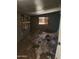 Bedroom requiring renovations with boarded up windows and tile floor at 3308 W Missouri Ave, Phoenix, AZ 85017