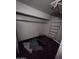 Empty closet featuring shelving, rack for hangers, and dark floors at 3308 W Missouri Ave, Phoenix, AZ 85017