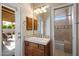 Bright bathroom with a single vanity, tile backsplash, and a shower/tub combination at 3350 E Rosemonte Dr, Phoenix, AZ 85050