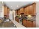 Well-appointed kitchen with granite countertops and stainless steel appliances at 3350 E Rosemonte Dr, Phoenix, AZ 85050