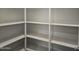 Walk in pantry with white shelving at 3354 S 180Th Ln, Goodyear, AZ 85338