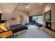 Inviting bedroom with a cozy fireplace and access to a private outdoor patio at 35180 N Boulder Pass, Scottsdale, AZ 85266